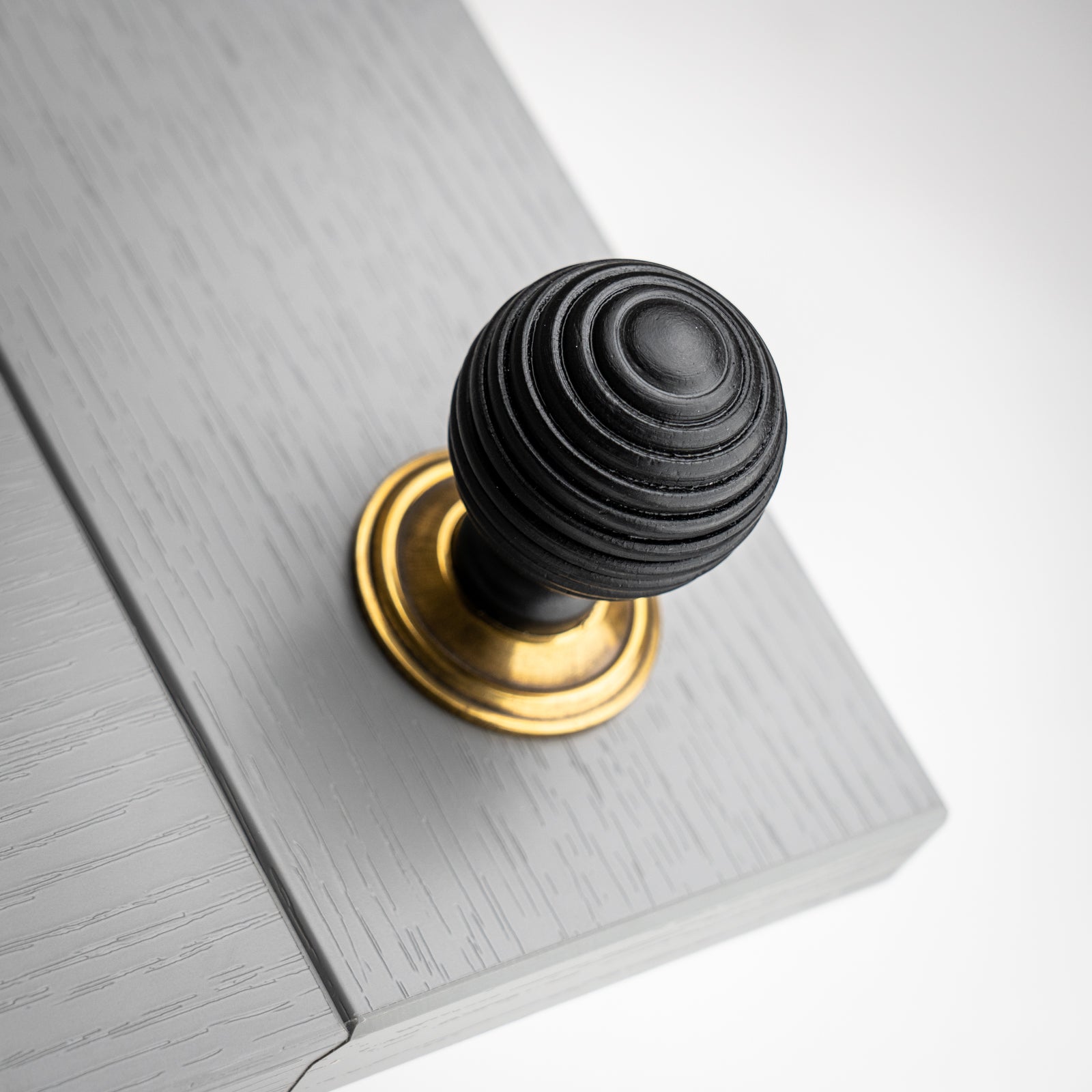 Beehive Ebonised Cabinet Knob with Antique Brass Rose Plate SHOW
