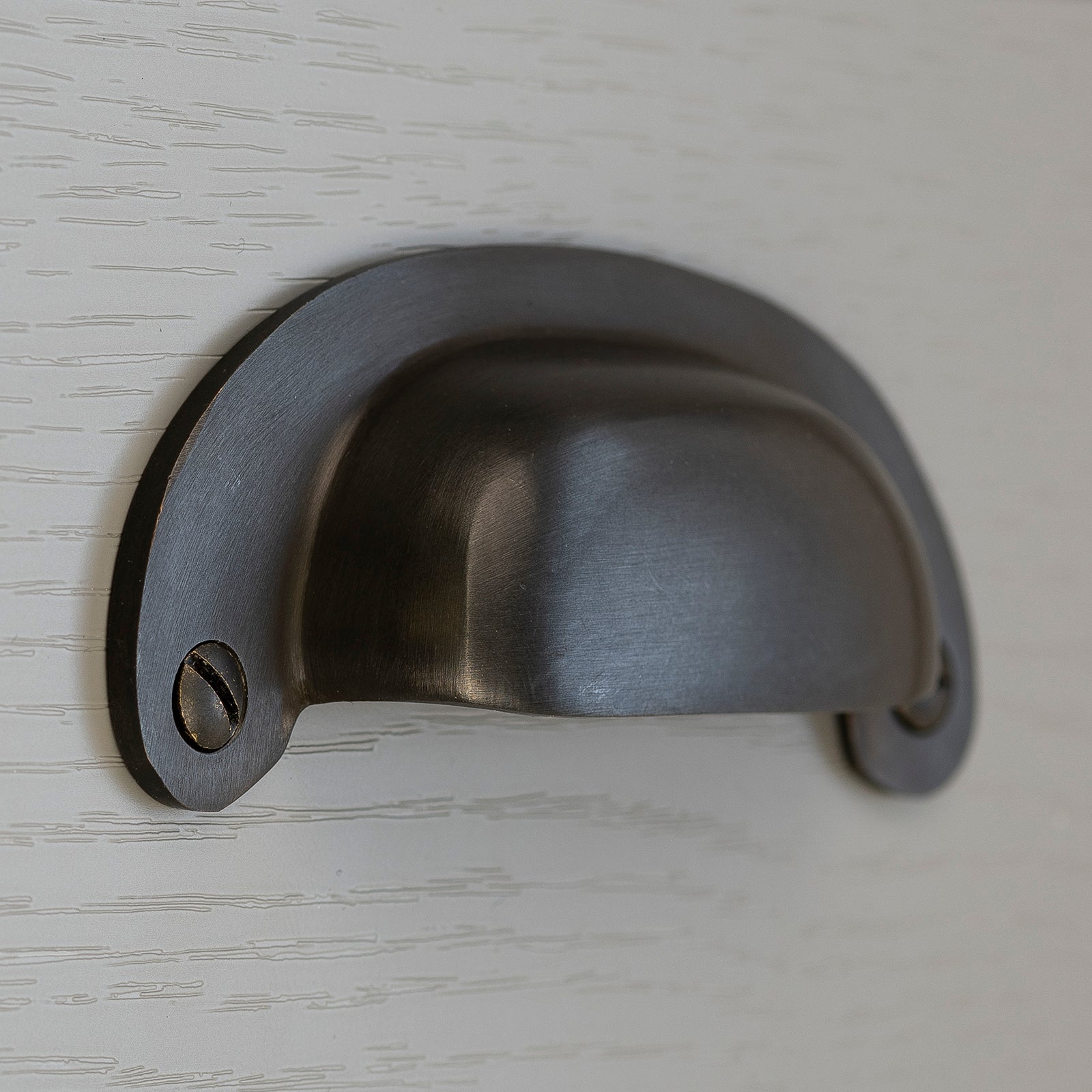 bronze drawer handle on cabinet SHOW