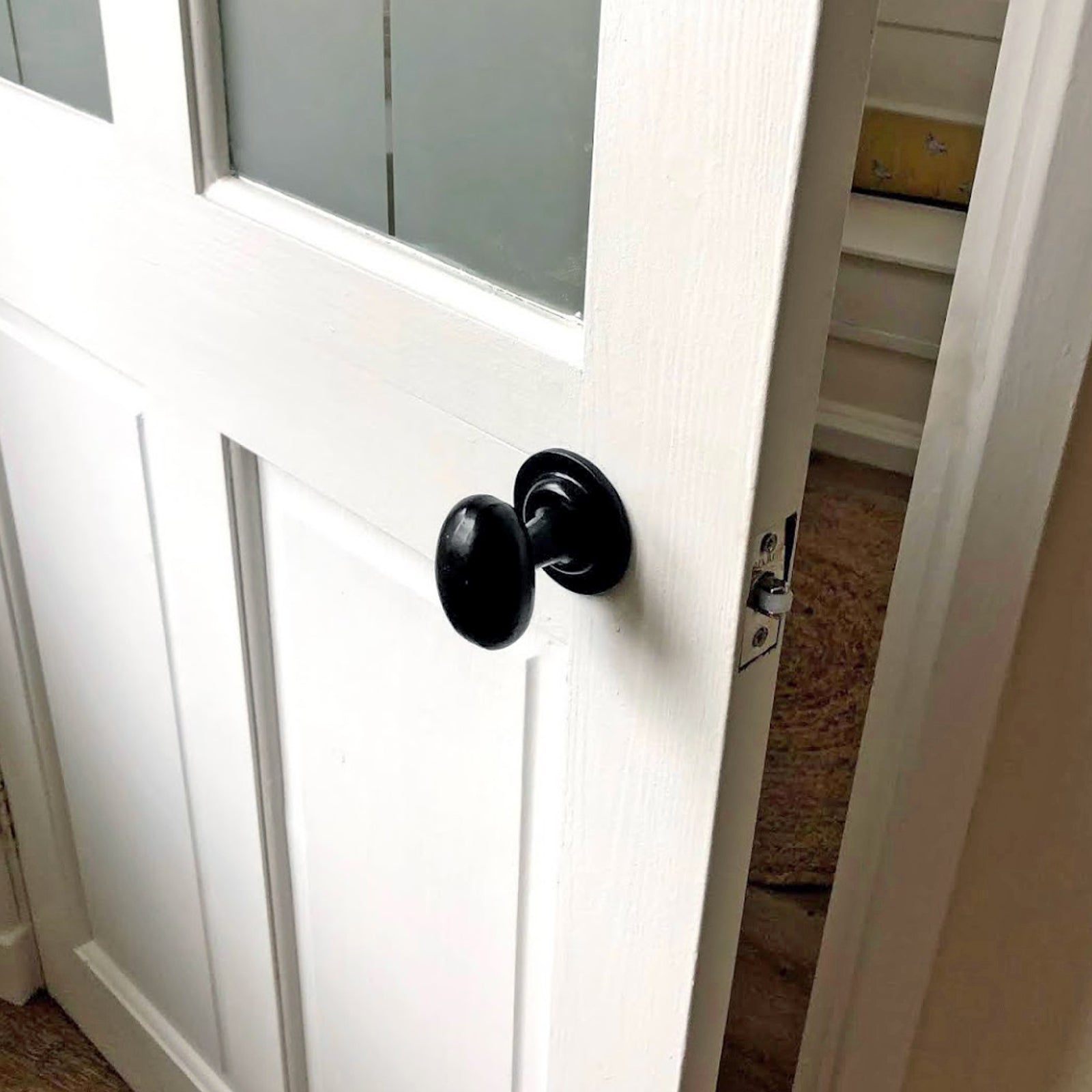 iron door handles, Door with oval black door knob SHOW