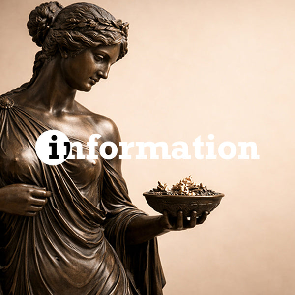 Image od a dark bronze statue of a lady holding a bowl.