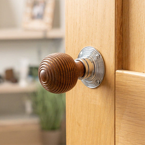 Beehive door knob on wooden door