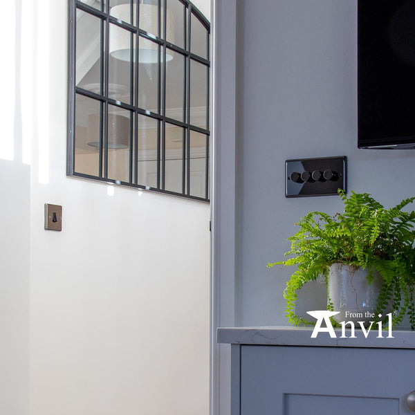 Image of quad dimmer and single switch fitted to a room