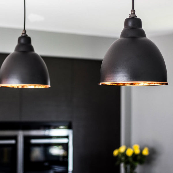 Matt black lights hanging from ceiling
