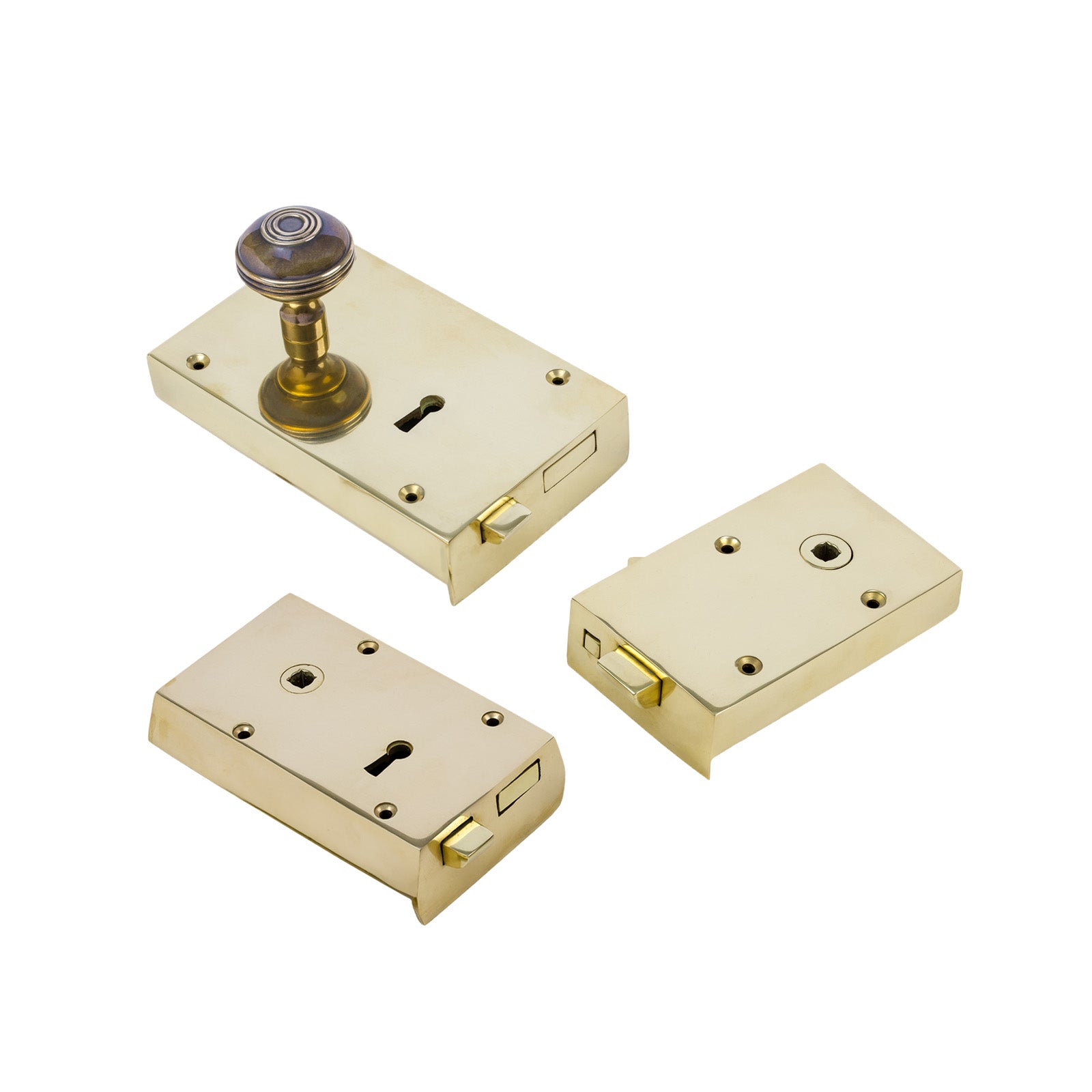 Heavy solid brass rim locks in 3 different designs, available with matching door knob sets.