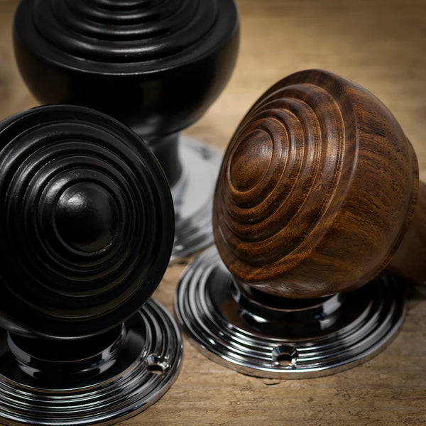 Collection of wooden and chrome door knobs