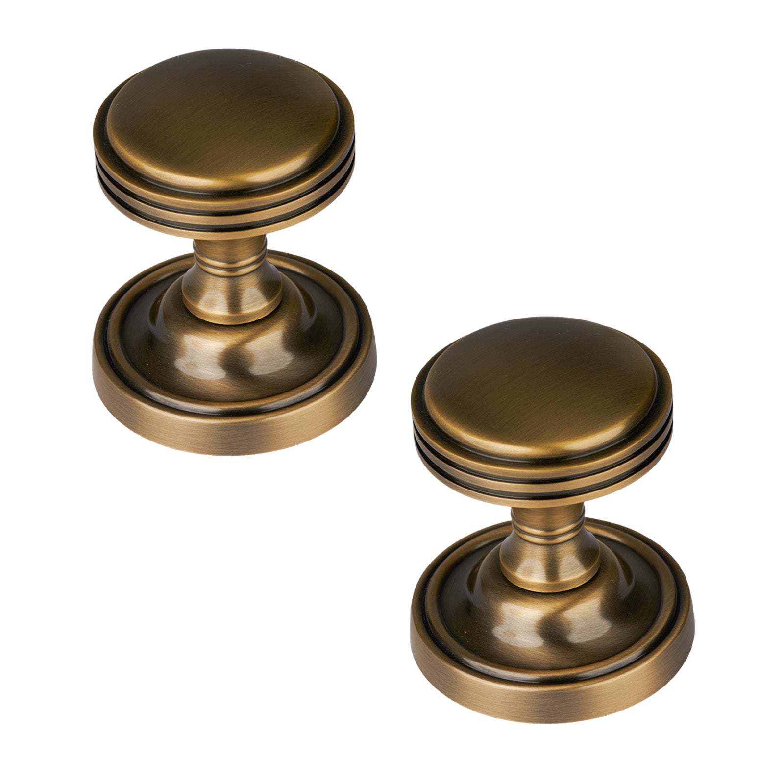 Whitehall Door Knob on Rose in Aged Brass finish