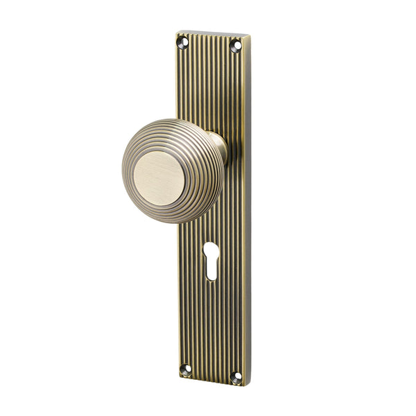 SHOW Image of Antique Brass Beehive Lock Handles