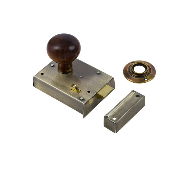  Bun Door Knob Set - Rosewood & Antique On Antique Brass Bathroom Rim Lock