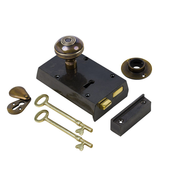  Left Handed Small Cast Iron Rim Lock With Antique Brass Ringed Door Knob Set
