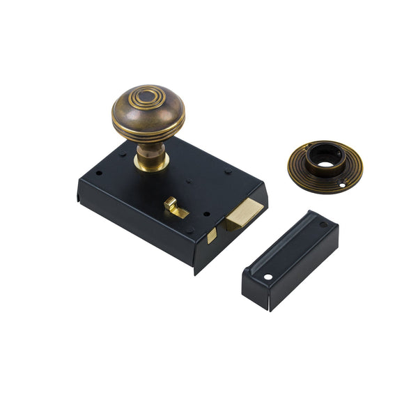  Ringed Door Knob Set - Antique Brass On Black Bathroom Rim Lock