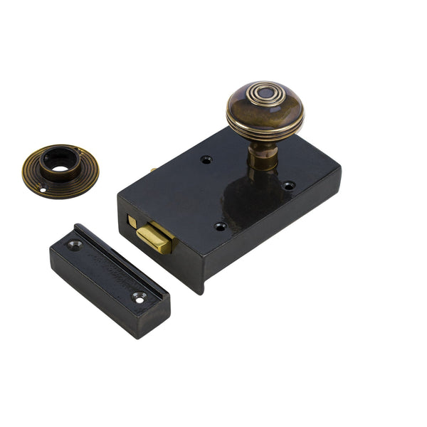  Right Handed Cast Iron Bathroom Rim Lock With Antique Brass Ringed Door Knob Set