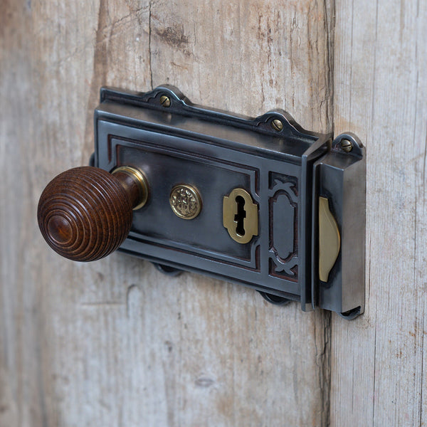  Lifestyle image of Ornate Iron Rim Lock on wood