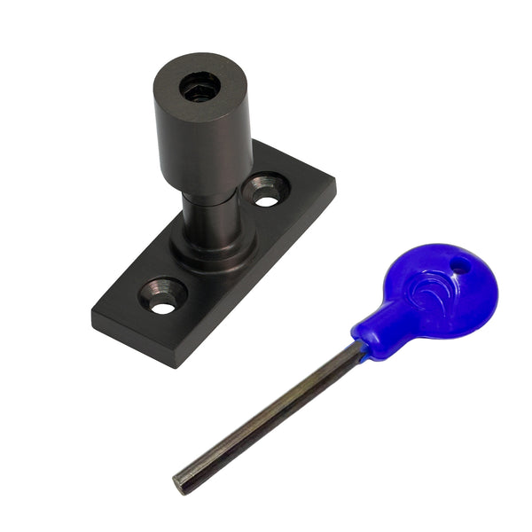  A bronze sash stop with a matching flat mounting plate, shown alongside a blue-handled hex key on a plain white background.