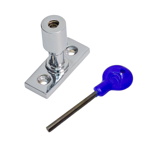  A chrome sash stop with a matching flat mounting plate, shown alongside a blue-handled hex key on a plain white background.