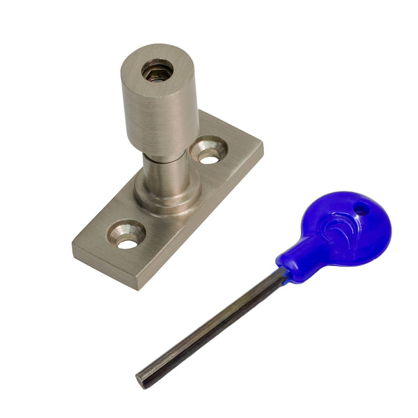  A satin nickel sash stop with a matching flat mounting plate, shown alongside a blue-handled hex key on a plain white background.