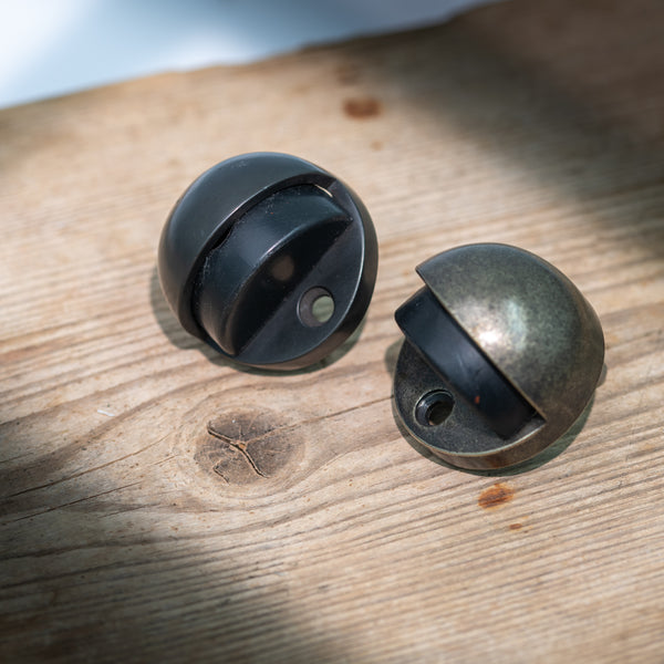  Hover Image of Bronze Half Moon Floor Mounted Door Stop