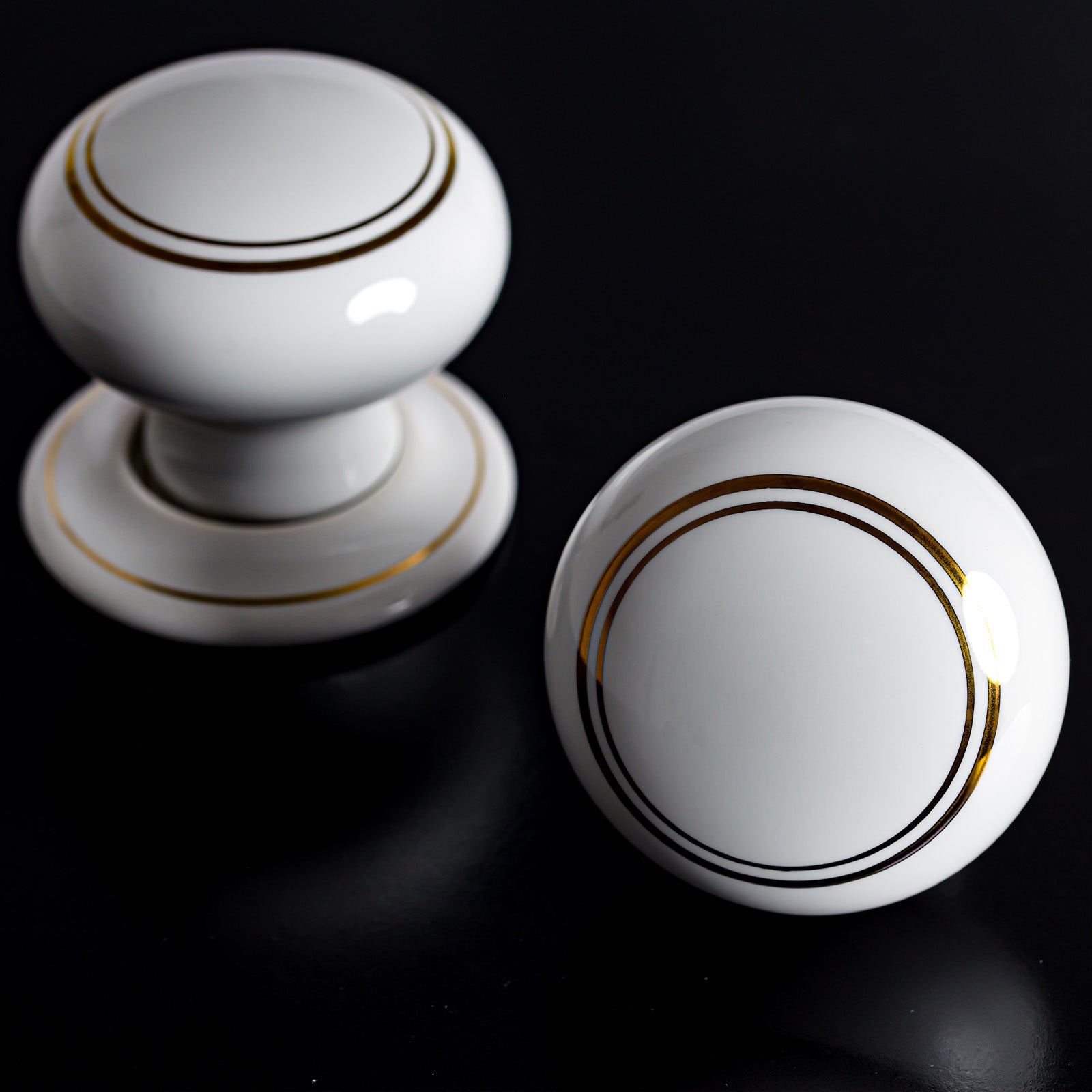 SHOW Moody Image of Gold Line Door Knob on Porcelain Rose