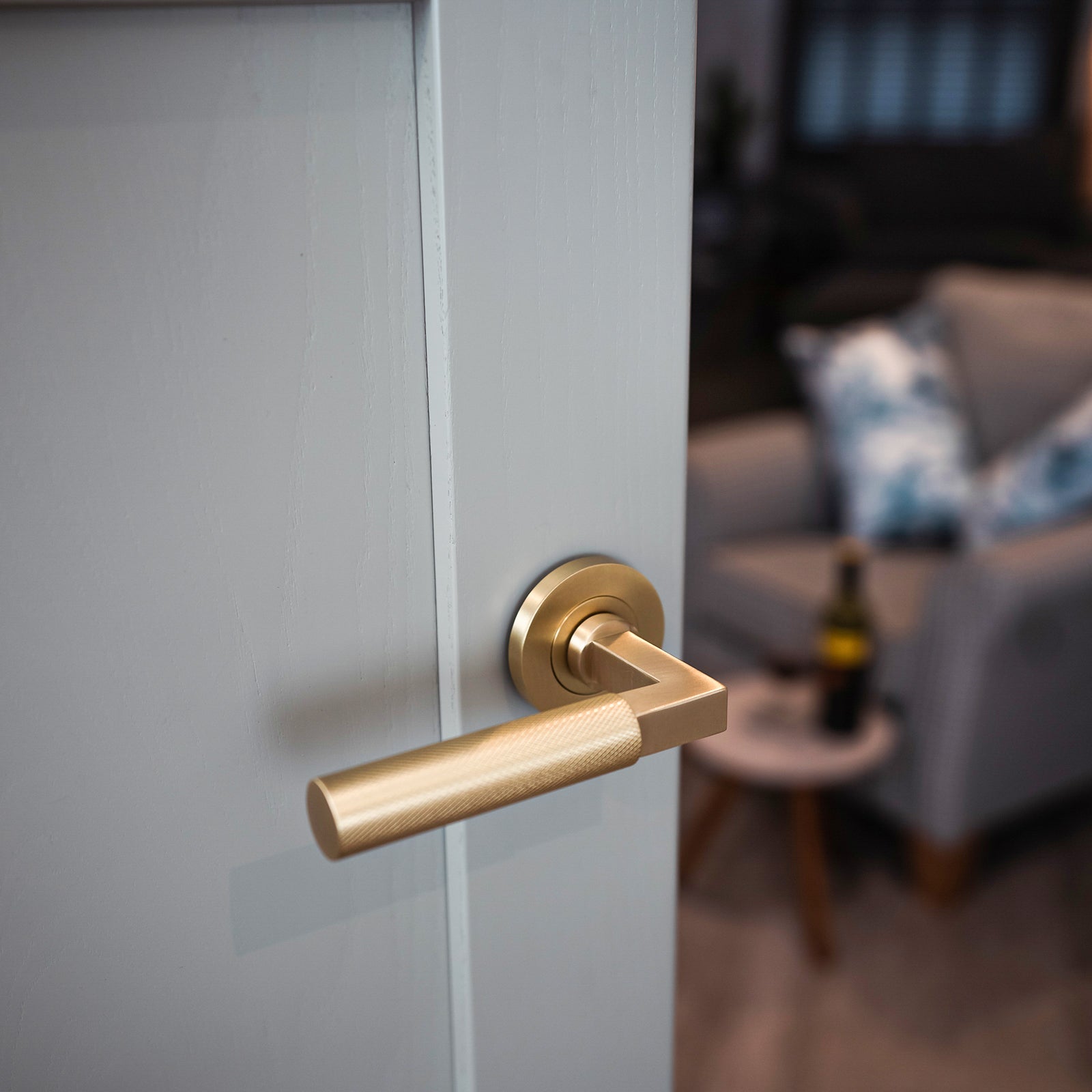 Satin brass knurled bar lever on rose door handle, designer handles SHOW