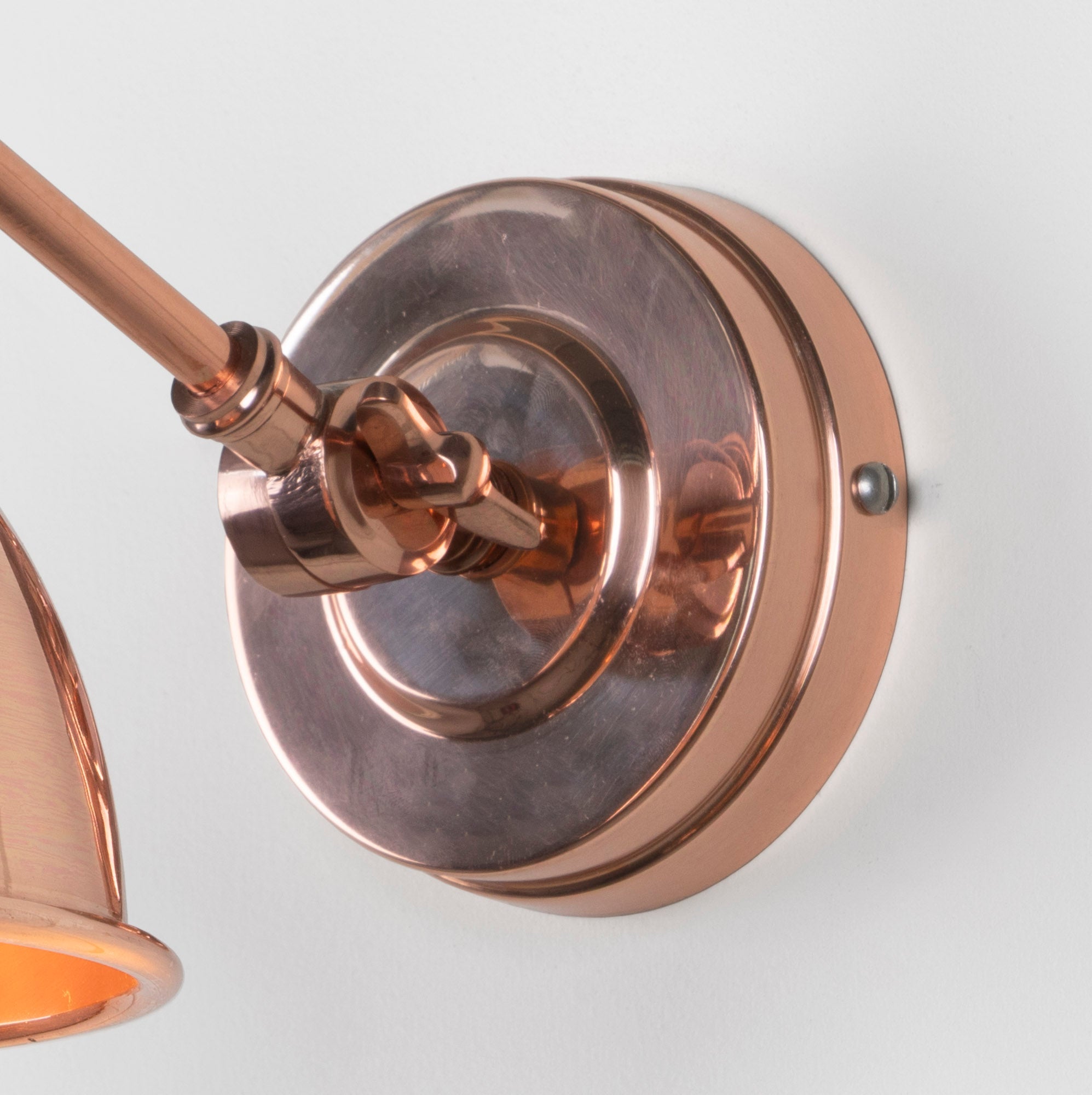 SHOW Close up Image of wall rose for Brindley Wall Light in Copper