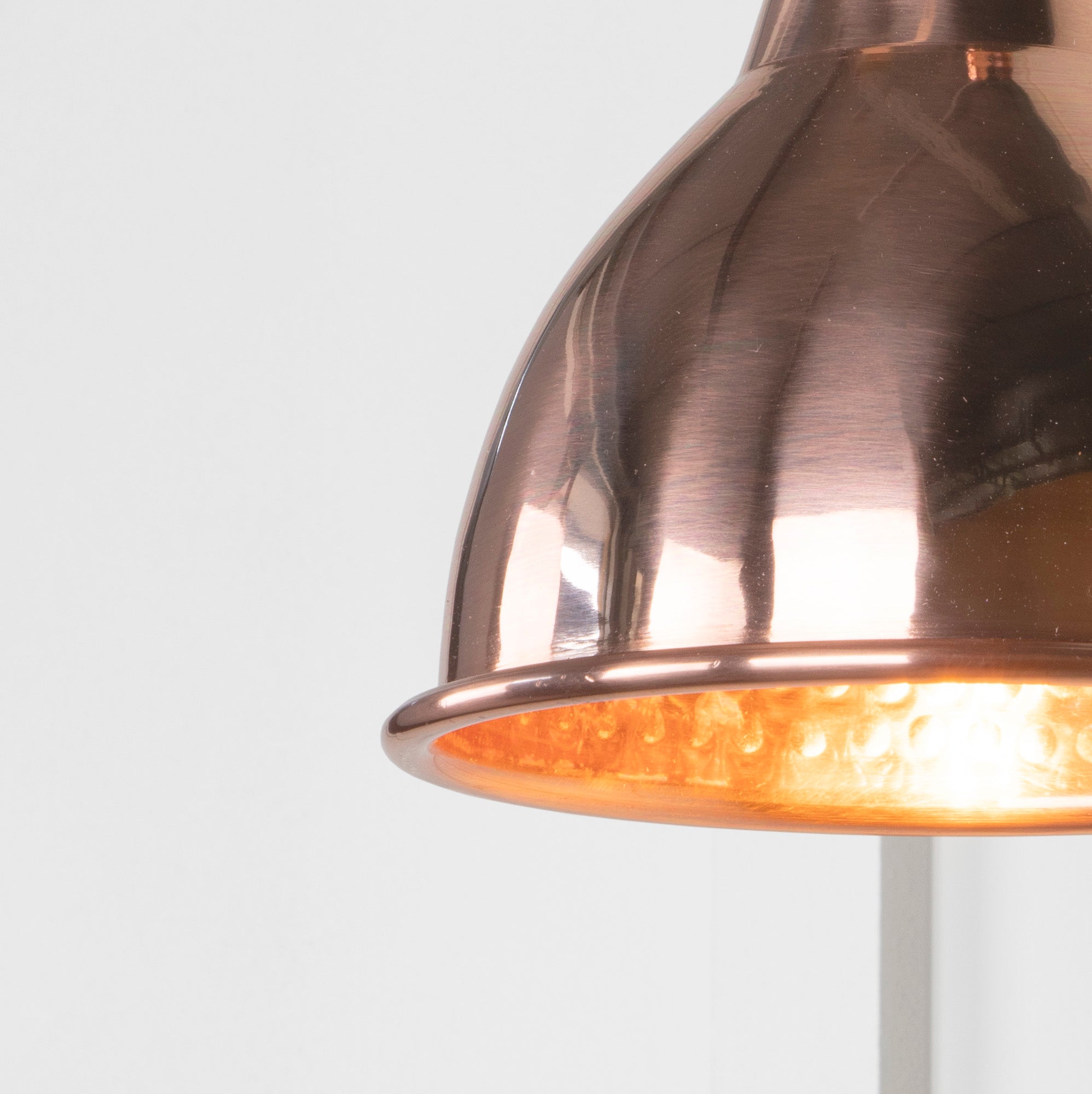 SHOW Close up Image of Brindley Wall Light in Hammered Copper