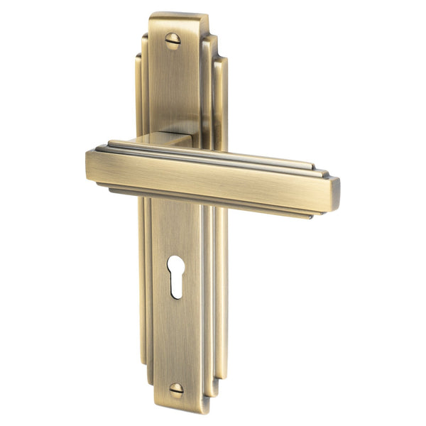 Astoria Door Handles On Plate Lock Handle in Aged Brass 