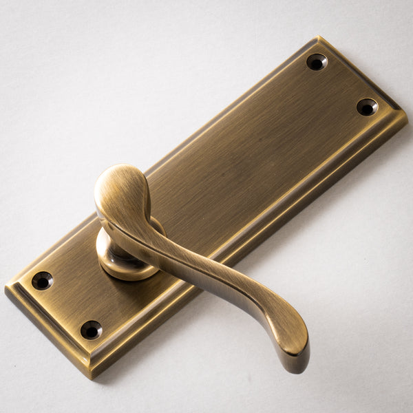 Edwardian Door Handles On Plate Latch Handle in Aged Brass 