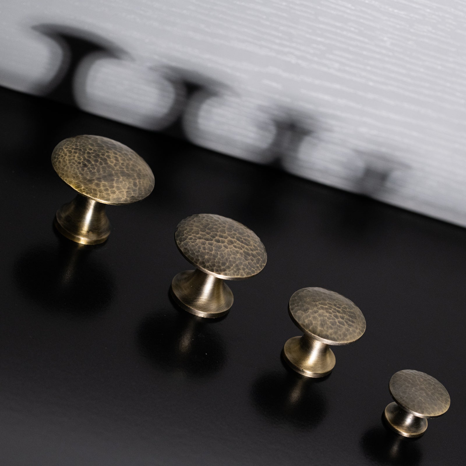 Hammered Classic Cabinet Knobs in Antique Brass SHOW