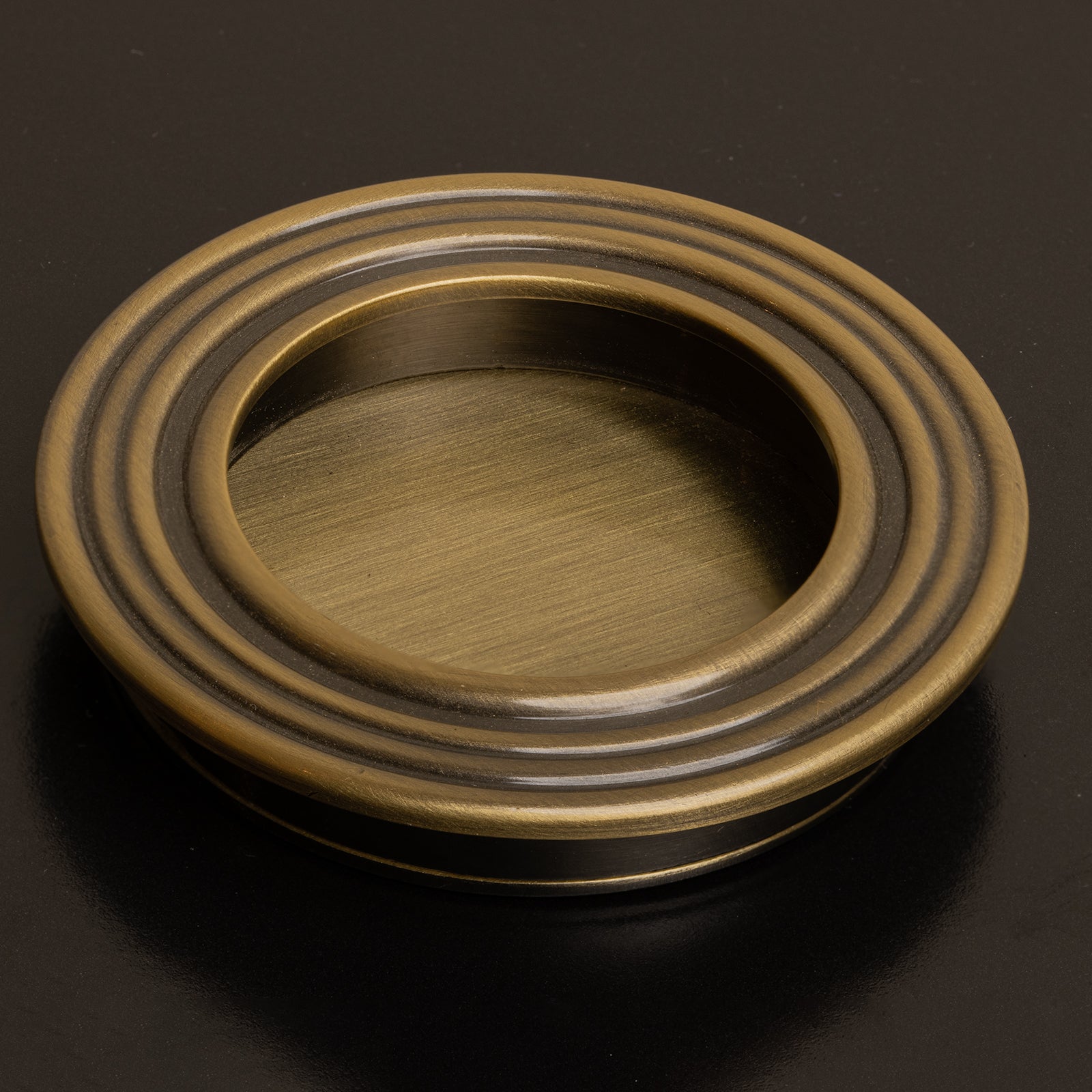 Round Reeded Flush Pull in Aged Brass SHOW