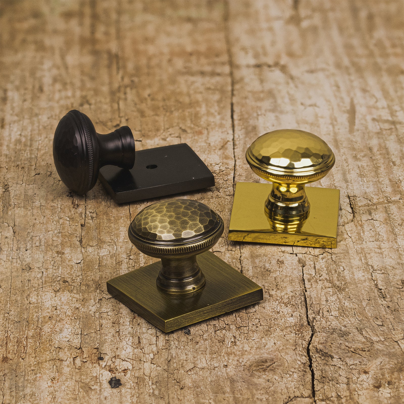 hand beaten cabinet knobs on square backplate SHOW
