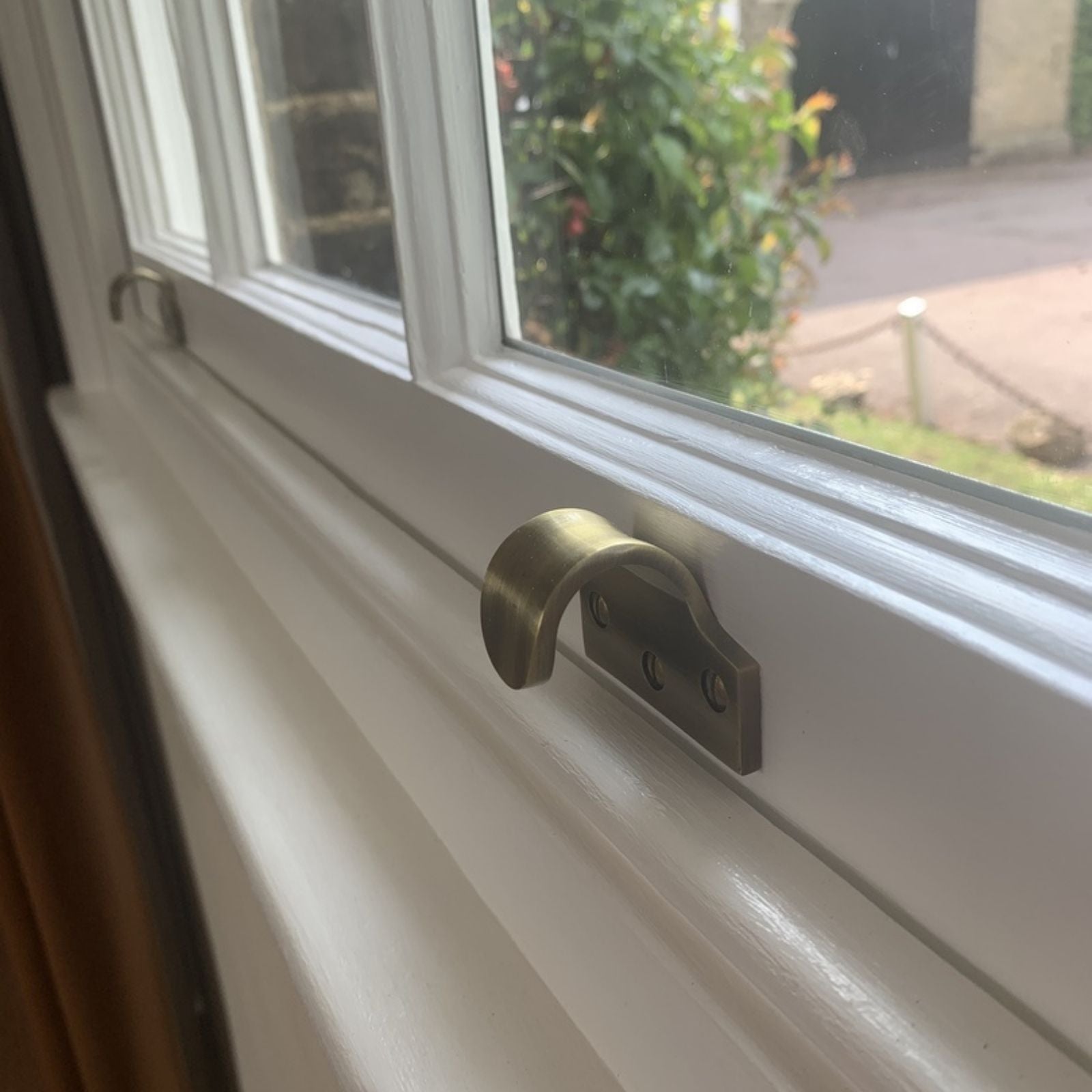 Window with Antique brass Sash Lift Hooks SHOW