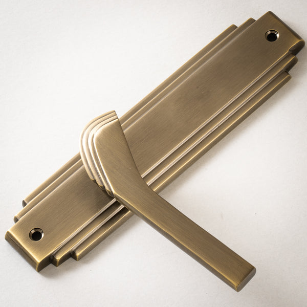Tiffany Door Handles On Plate Latch Handle in Aged Brass 