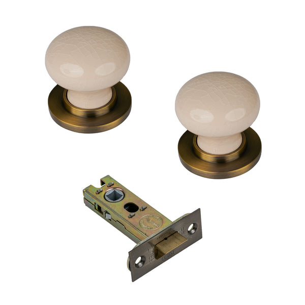 SHOW Cream Crackle Ceramic Door Knob with Aged Brass Rose with 3 inch latch